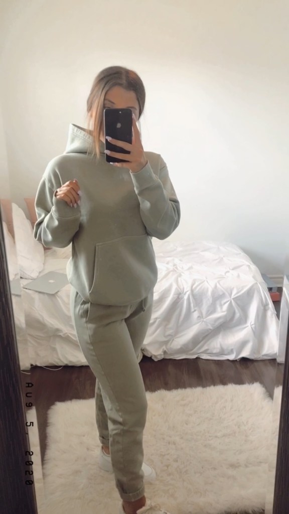Monochromatic green sweatsuit styled with nike Air Force 1 shoes